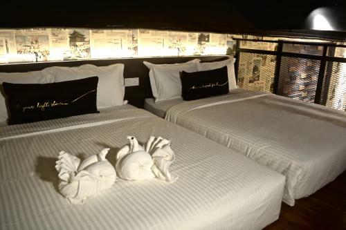 Iconic Suites & Pods Hotel