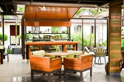 Hostal Qi Hotel And Club