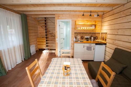 Sheregesh's Wood Chalets & Apartments