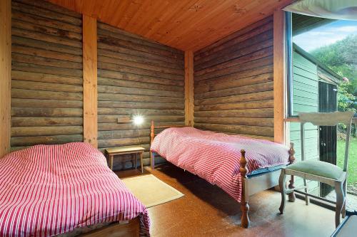 98 Ocean Parade - Rustic Log Cabin