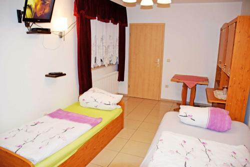 Ferienwohnung/ Ferienzimmer Asche