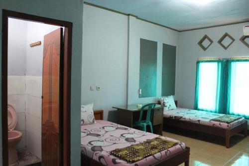 Posada Penginapan Artha