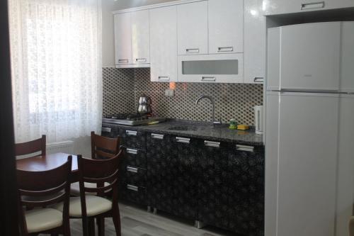 Apartamento Kurtar Suites-1