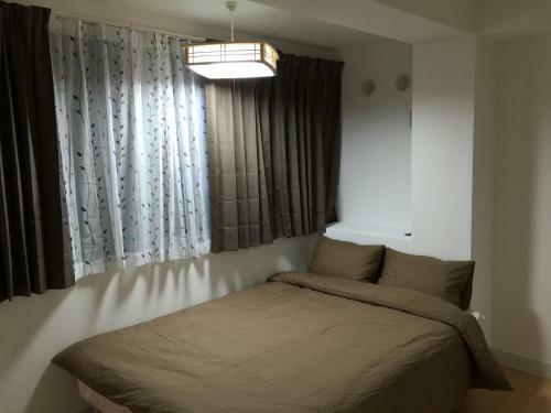 Apartamento Issyuku Hostel
