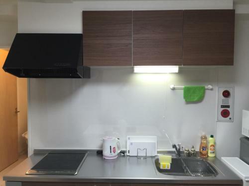 Apartamento Issyuku Hostel