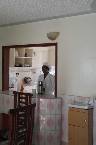 Hostal Palm Airport Suites