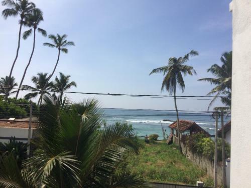 Hostal Blue Corals Beach Bungalow