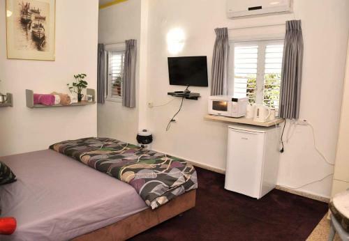 Hostal Tom's Place Giv?atayim