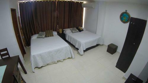 Di Apartment & Suites