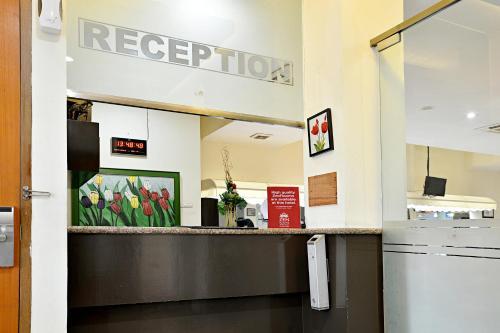 Hostal Zen Rooms Benhil Tondano