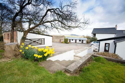 Apartamento Coach Road Cottages