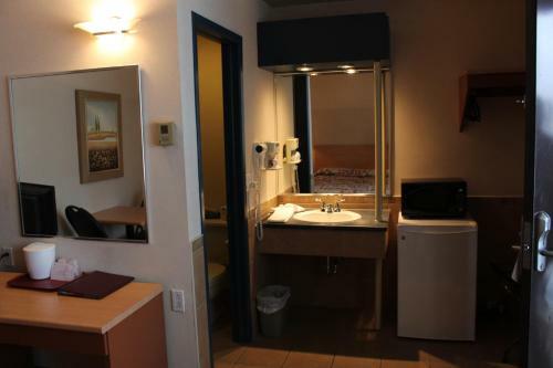 Le Capri Motel Et Suites