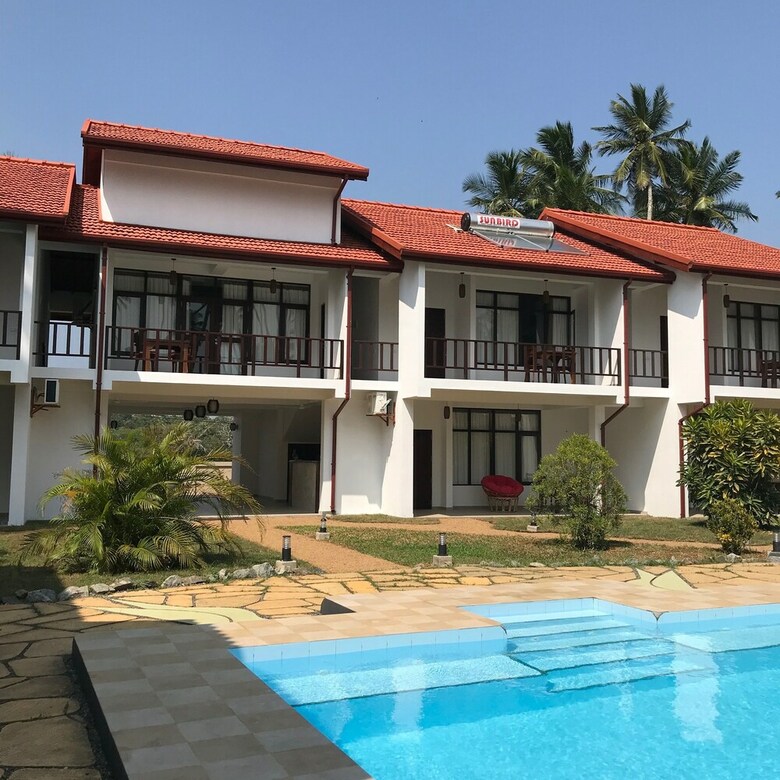 Hotel Green Parrot Beach Resort