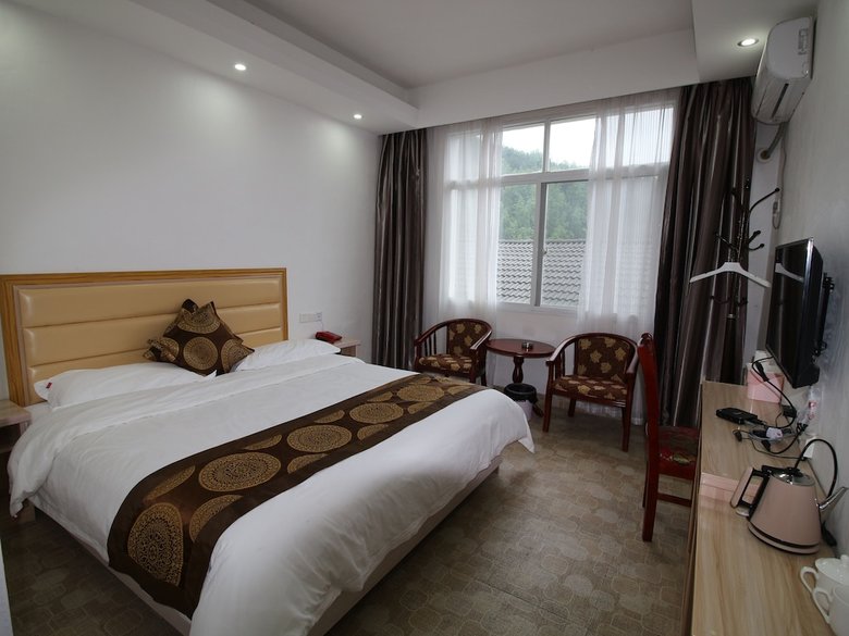 Hotel Zhangjiajie Red Apple Inn