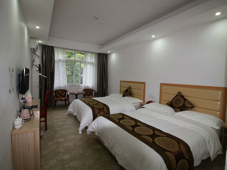 Hotel Zhangjiajie Red Apple Inn