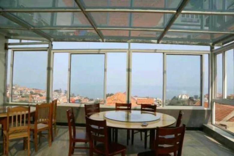 Hotel Qingdao Paradise Seaview Cottage