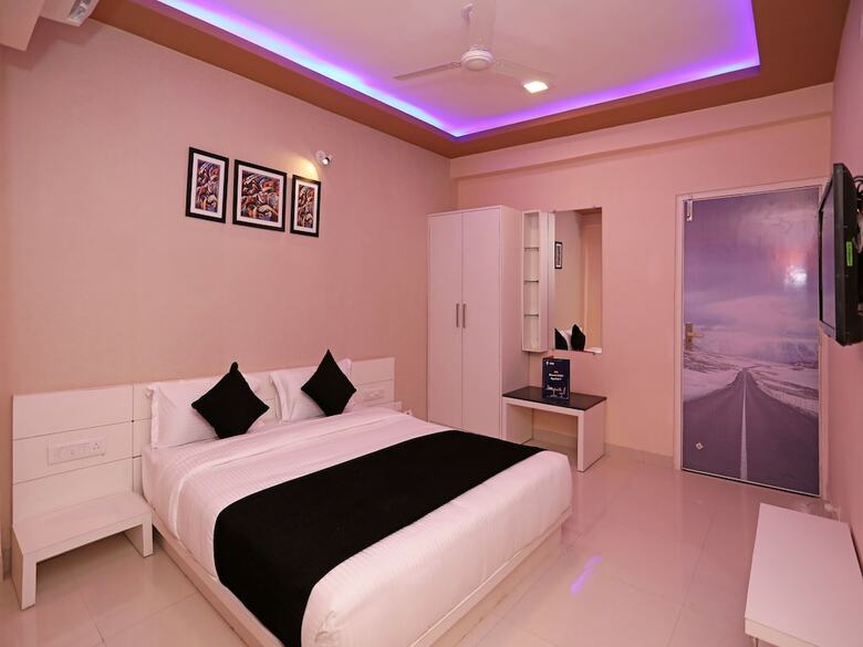 Hotel Capital O 9670 Gg Holiday Apartment