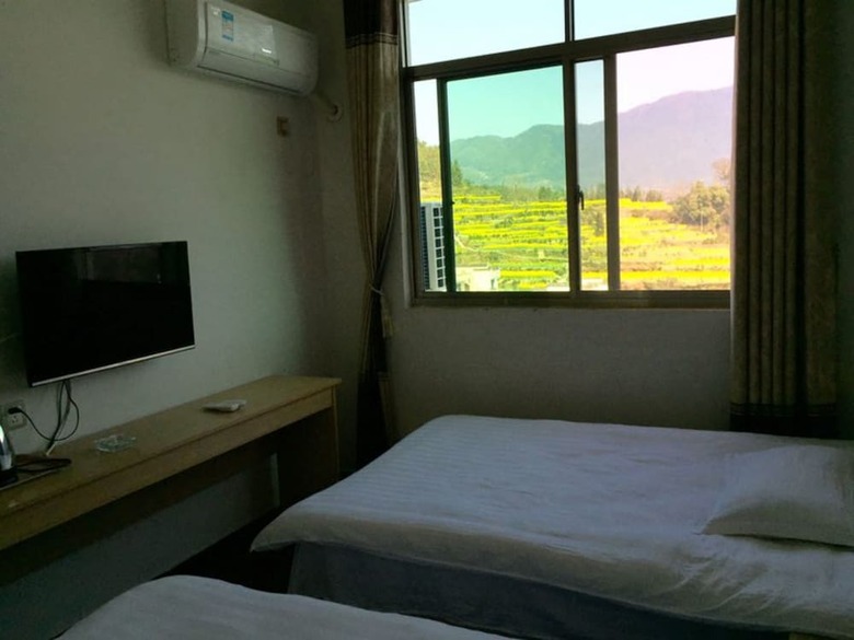 Posada Wuyuan Jiangling View Inn