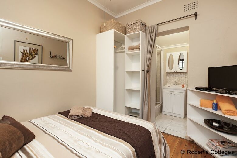 Apartamentos Robert's Cottages
