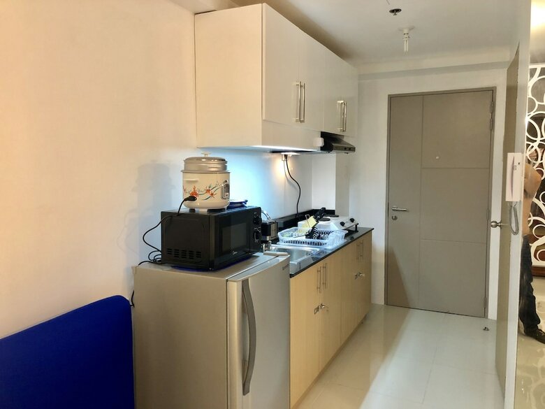 Dr. Calayan's Cozy Wind Residences Tagaytay Taal View