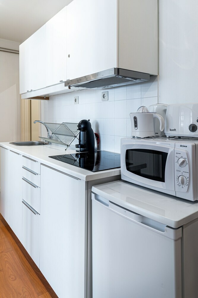 Home @ Porto Cl�rigos Apartment