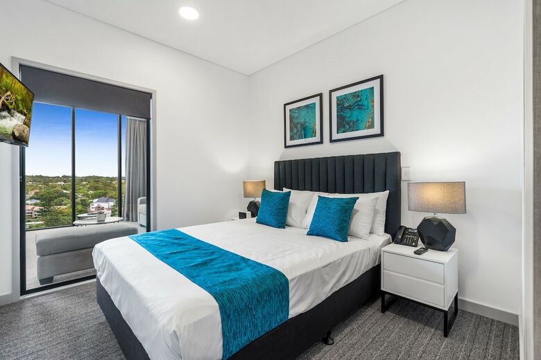 Hotel Essence Suites Taringa