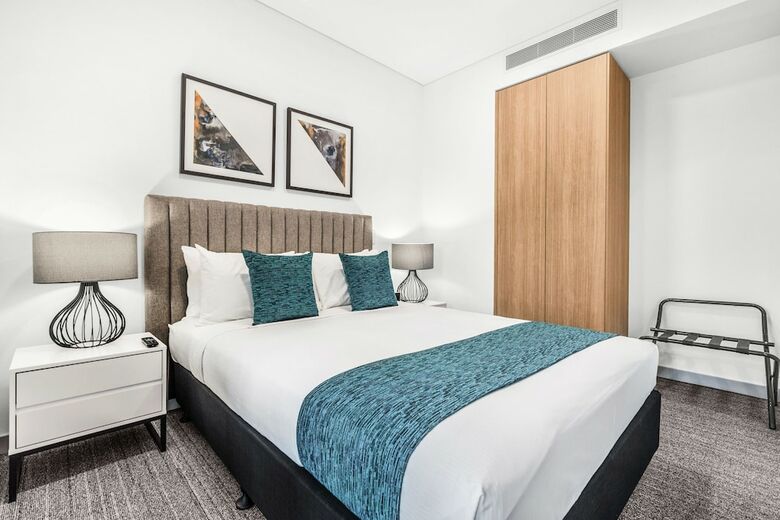 Hotel Essence Suites Taringa