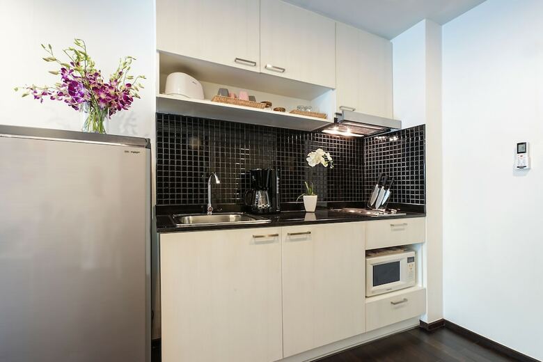 Apartamentos The Title C107