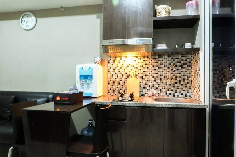 Pool View Green Pramuka Apartment