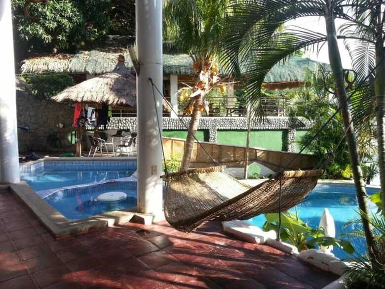 Hotel Dolphinbay Beachfront & Dive Resort
