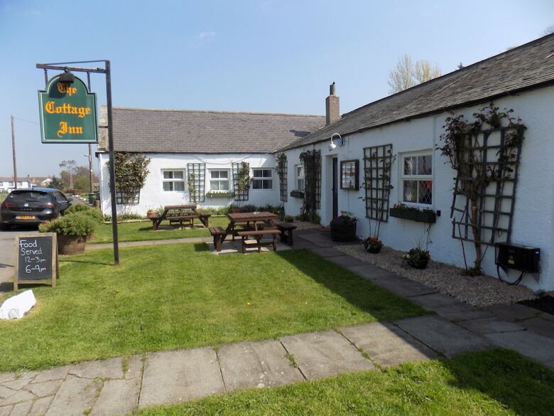 Posada The Cottage Inn Hotel