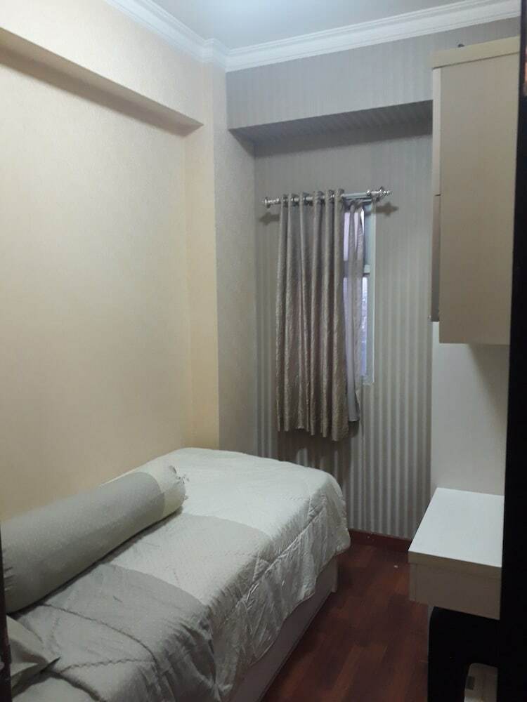 Apartment The Suites Metro By Herlan