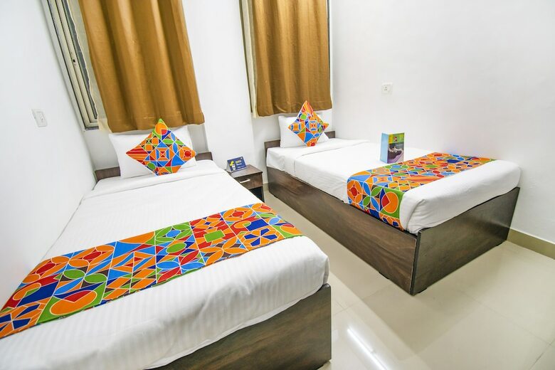 Fabhotel Purple Orchid