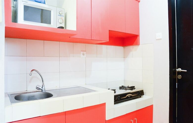 Simple Studio With Balcony At Gardenia Boulevard Apartment