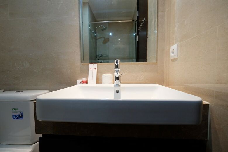Homey Studio Menteng Park Apartment