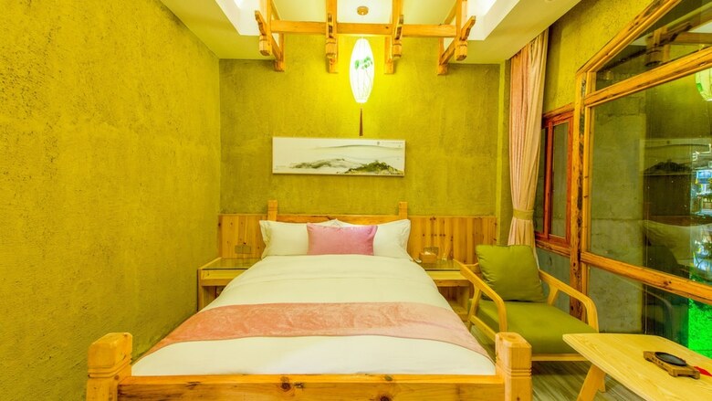 Floral Hotel Fenghuang Huercaowu