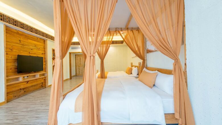 Floral Hotel Fenghuang Huercaowu