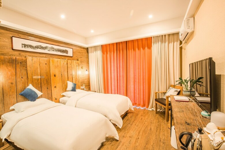 Floral Hotel Qiannan Mulanfang