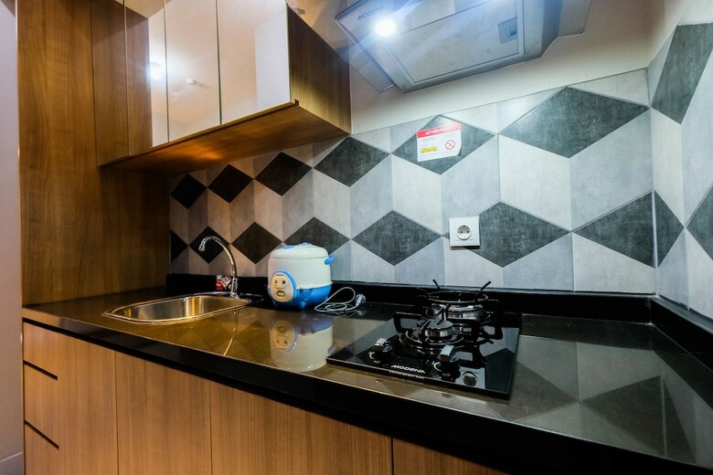 Homey And Tranquil Studio Casa de Parco Apartment
