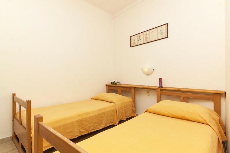 House Cukon / Two Bedrooms Apartment