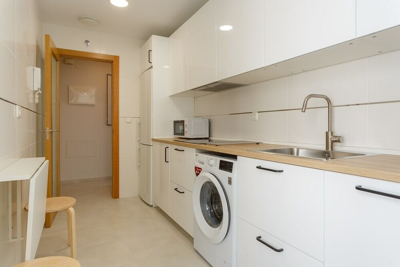 Real Escuela Home Surthy Apartments