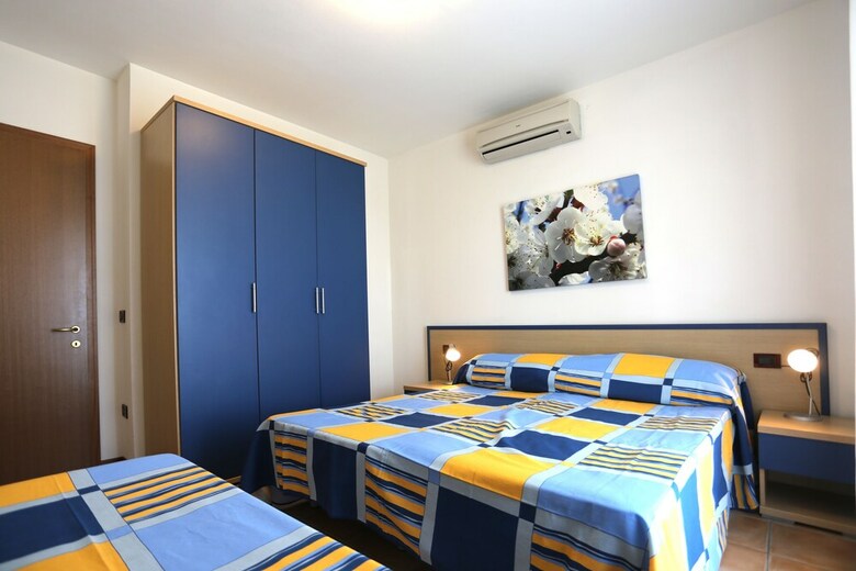 Apartamento Villaggio Pini