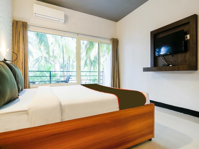 Hotel Oyo Flagship 267 Morjim Grand Inn