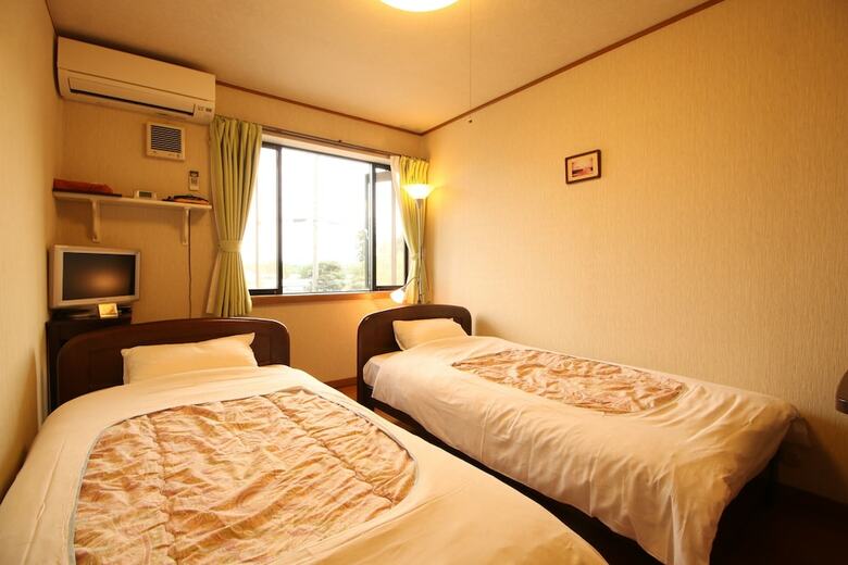 Hotel Ryokan Kurumiya