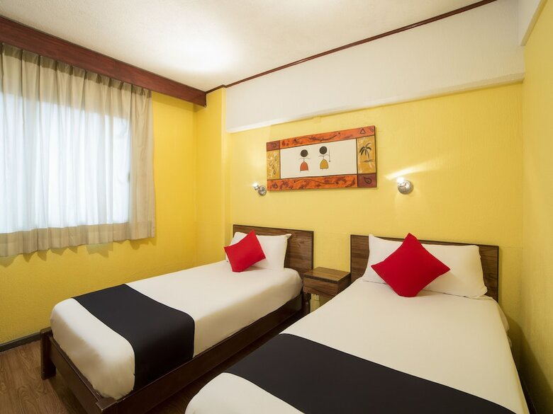 Hotel Capital O Rex