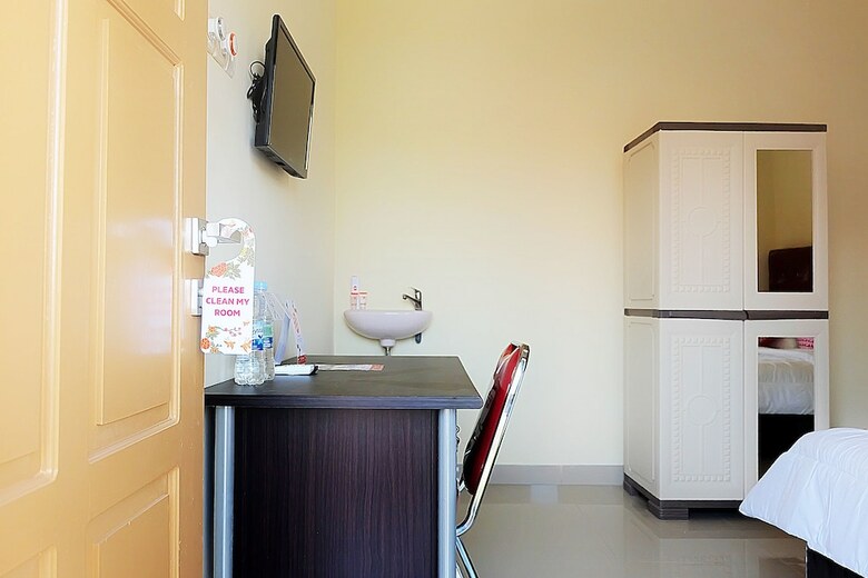 Hostal Oyo 1126 Trio R Kost