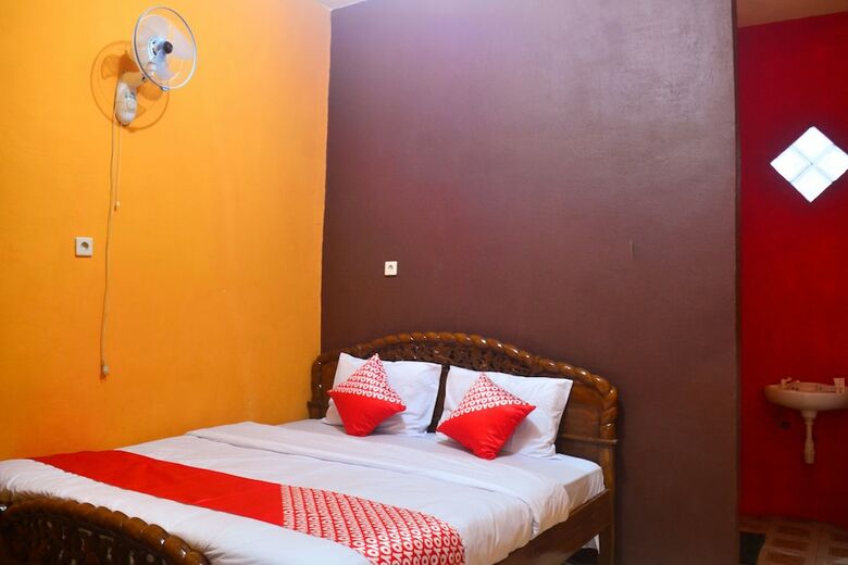 Hostal Oyo 1145 Rita Guesthouse