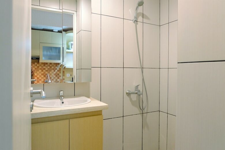 Homey Studio Apartment At Grand Kamala Lagoon