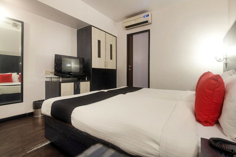 Hotel Capital O 45497 Savoy Suites