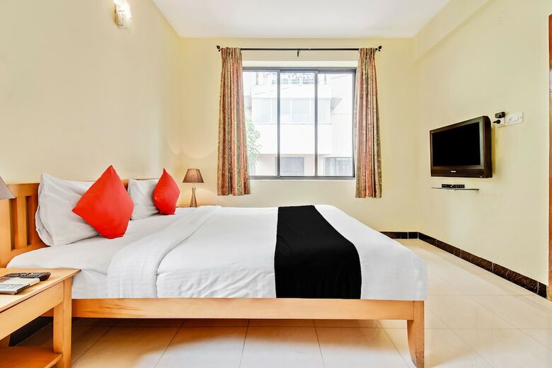 Hotel Capital O 49932 Orchard Suites